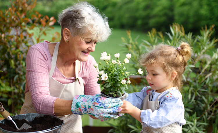 Illustration woman hands a plant over to a child
